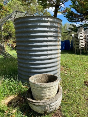 OLD TANK Potential raised garden bed to be cut in halve and 2 concrete garden pots