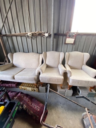 Cream material 2 seat sofa with 2 arm chairs. (Damaged)