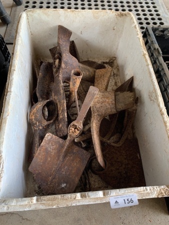 Mixed lot of mattock, hoe, and rake heads