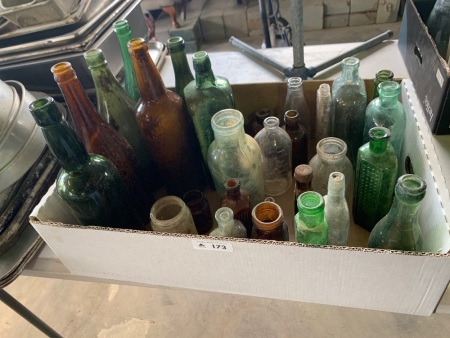 Assorted vintage glass bottles