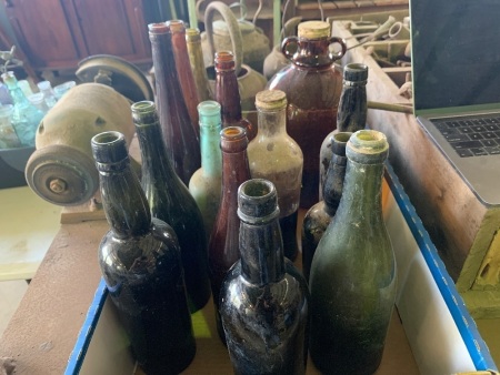 Assorted glass bottles and demijohn