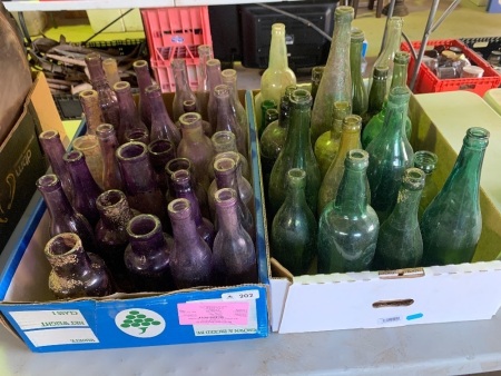 Large lot of vintage green and purple glass bottles