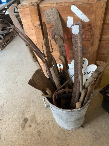 Galvanized bin with assorted tools