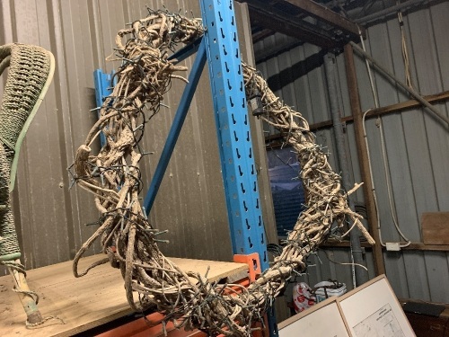 Wreath made from roots and vine with fairy lights