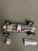 A CMC Auto Union 1936 - large 1:18 scale. This is their website. It is number 853 of a limited edition of 5000  https://www.cmc-modelcarshop.de/en/cmc-model-cars-118/cmc-auto-union-typ-c-4-1936.html Quite amazing detail and assembled from 1026, mainly met - 2