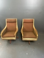 Set of gold vinyl high-back swivel chairs