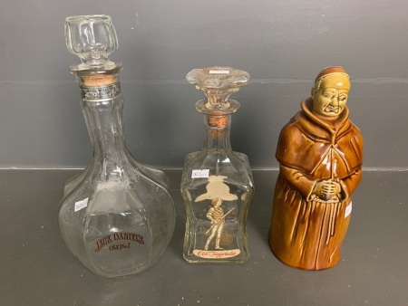 1 x Jack Daniels Glass decanter, 1 x Old Fitzgerald glass decanter, 1 x Abbot's Choice Monk bottle