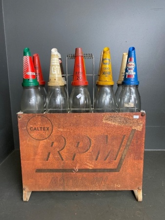 10 x quart oil bottles in CALTEX RPM stand