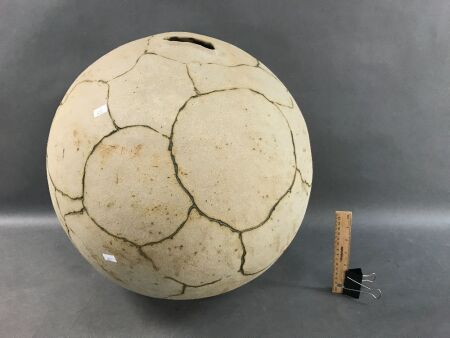 Large Pottery Ball with Incised Pattern