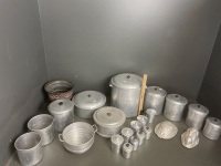 Large collection of Aluminium ware. 2* cake tins, 1 bread tin with lid, 3* caniters / label (1 lid), 4* canisters /no labels 4 lids, 2* jelly moulds, 1* coulinder,* spice jars with lids, 5* spice jars with lids - 4