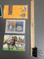 Qty commemorate coins in boxes ,including 2 x Australian 1st proof $1 coins, Don Bradman $5, 3 x royal mint coins, lady Diana marriage coin, 3 x 50cent and 1st day Melbourne cup stamp - 4