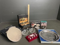 Fine dining items including silverplate placemats, coasters, serving platter and avocado dishes - 3