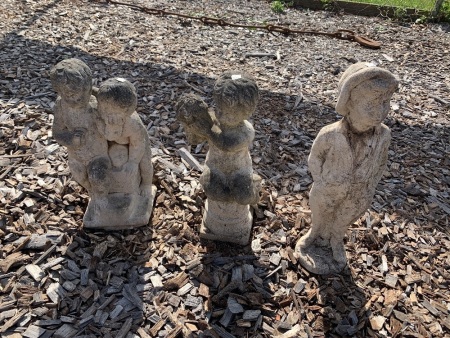 3 concrete garden statues