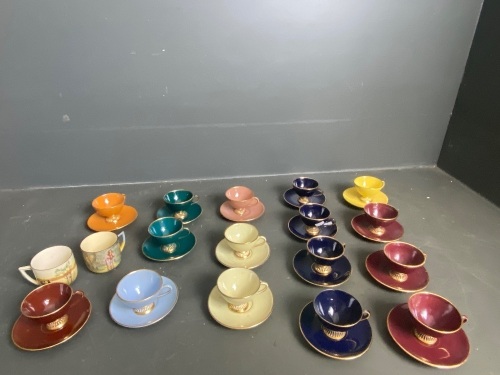 16 cups and saucers assorted colours