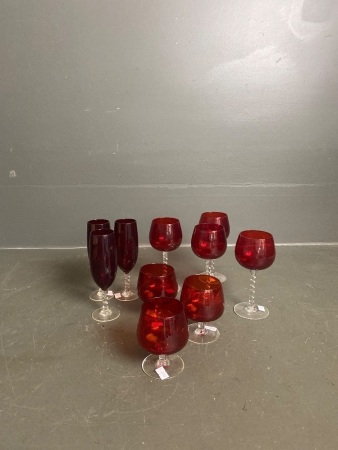 Lot red/clear glass wine glasses and goblets and ruby/clear glass champagne glasses - some with twisted stems