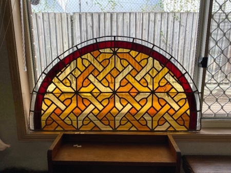 stained glass window insert (broken glass on some lower ends)