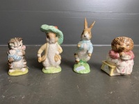 4 small Beatrix Potter figurines - Miss Moppet, Benjamin Bunny, Mrs Tiggy Winkle, Peter Rabbit