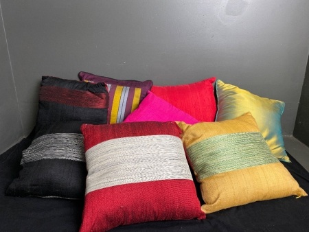 8 silk covered pillows