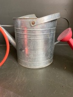 1 large metal bucket, 1 large metal watering can 2 small red metal watering cans - 2