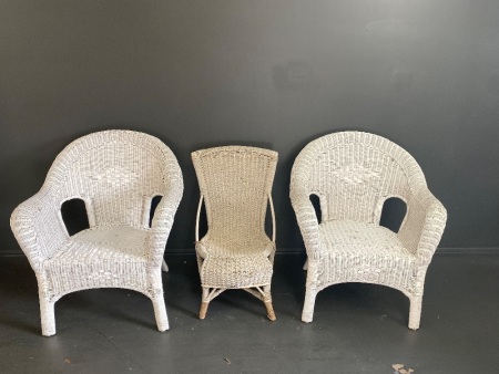 2 large and 1 small white cane chairs