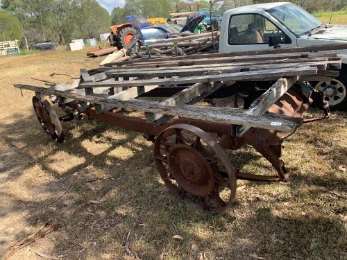 Large garden cart believe to be made from Chevrolet chassis with handmade wheels