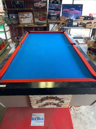 Pool table with over head light and cues 