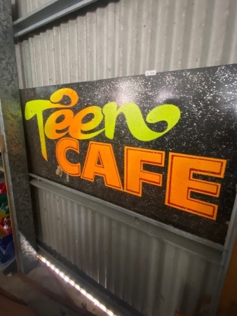 Teen Cafe metal sign