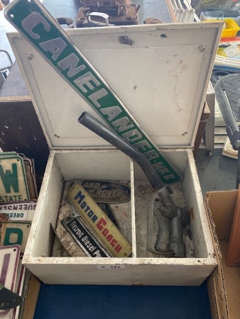 Metal storage cupboard with some name plates 