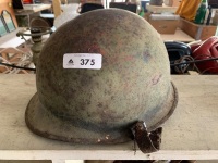 Antique metal military helmet