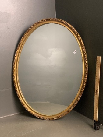 Carved and Gilt Framed Oval Mirror