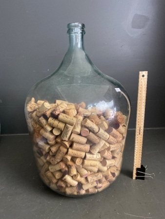 Large Glass Demijohn filled with corks