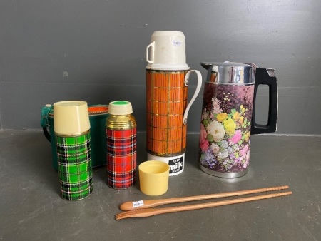 Selection of vintage thermos and wooden salad servers