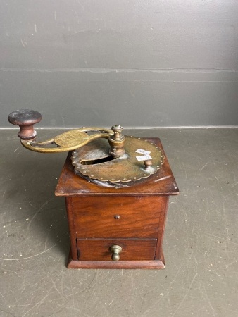 Vintage brass and wooden coffee grinder