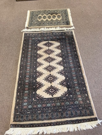 2 hand woven floor rugs made in Pakistan