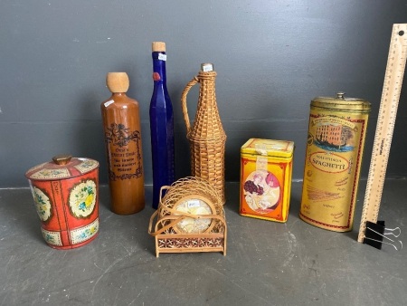 Selection of vintage tins, bottles and coasters