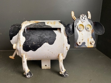 Funky metal cow post box