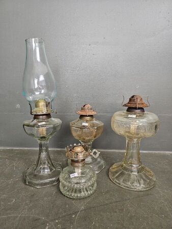 3 large clear glass lanterns and 1 small (3 without flutes)