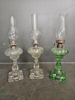 Set 3 kerosene lanterns - 2 clear glass and one green glass