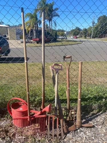 Assortment of mixed garden tools and equipment