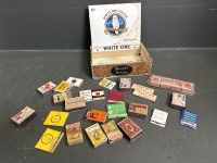 Selection of old matchboxes and match books in White Owl brand tabacco box