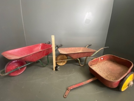 2 vintage kids metal wheel barrows and vintage metal wagon