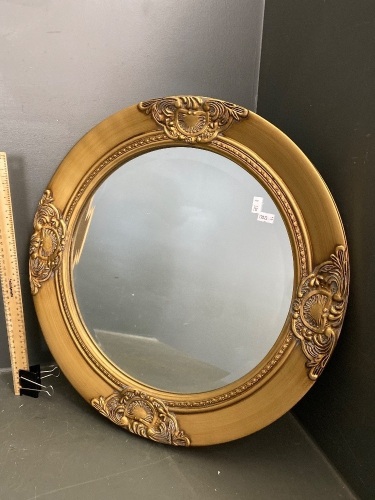 Round ornate mirror