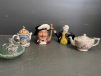 Mixed selection of collectable teapots, milk jug and glass handpainted butter dish