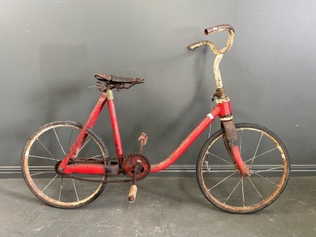 Vintage hard tail push bike with spring seat