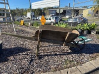 Vintage wooden wheel barrow