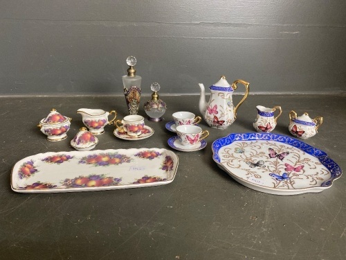 Collection of mini collectable tea set and perfume bottles