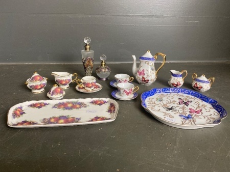 Collection of mini collectable tea set and perfume bottles