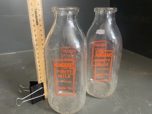 2 x Niagara Falls clear glass milk bottles