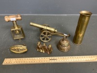 Assorted Brass Lot inc. Nutcracker, Cannon, Bell, Shell Casing, Buckle and 3 Monkeys