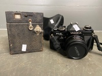 Antique Box Camera and Yashica FX-D Quartz camera